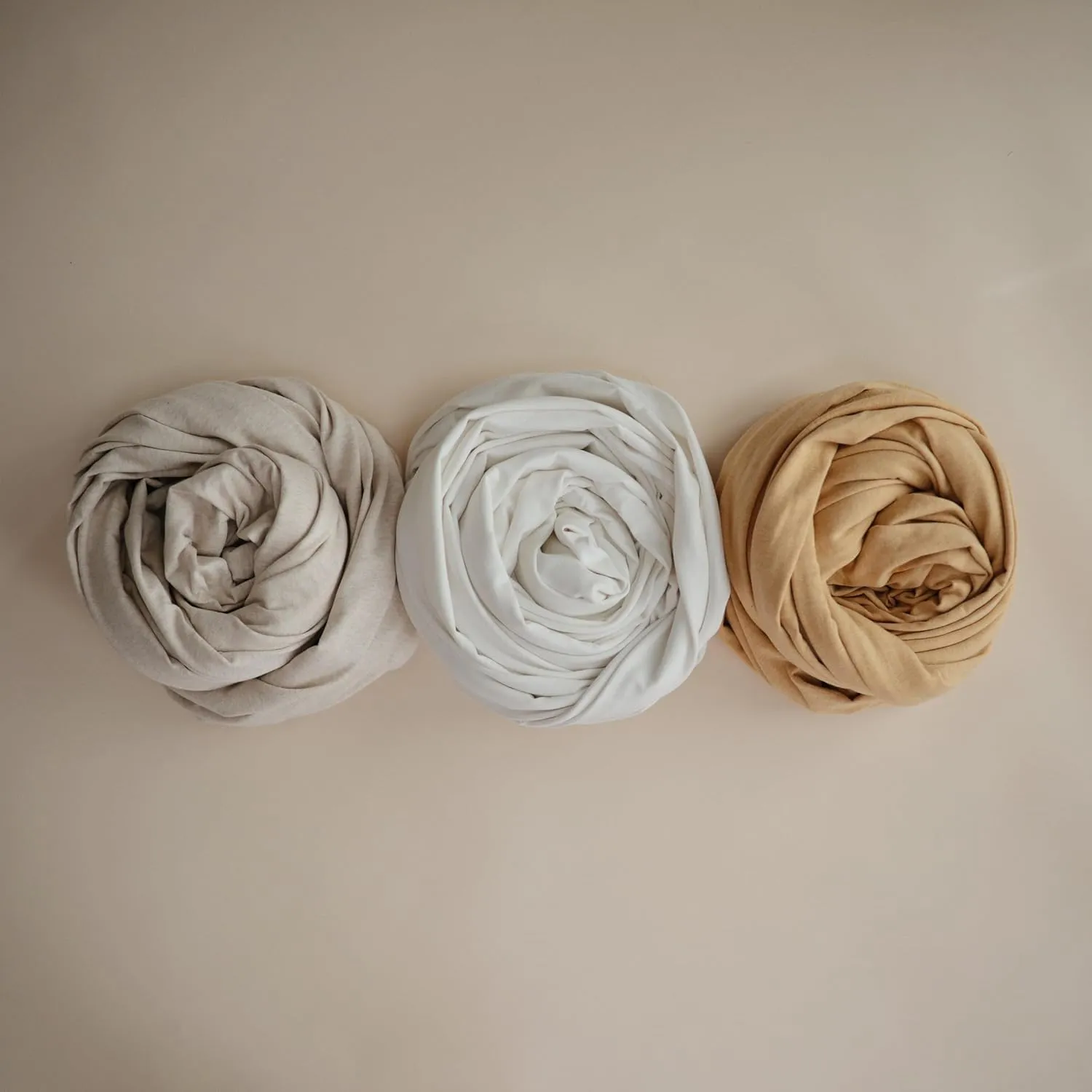 mushie Baby Wrap Carrier | Organic Cotton and Elastane | Infant Sling for Newborn and Babies 8-35 lbs (Ivory)